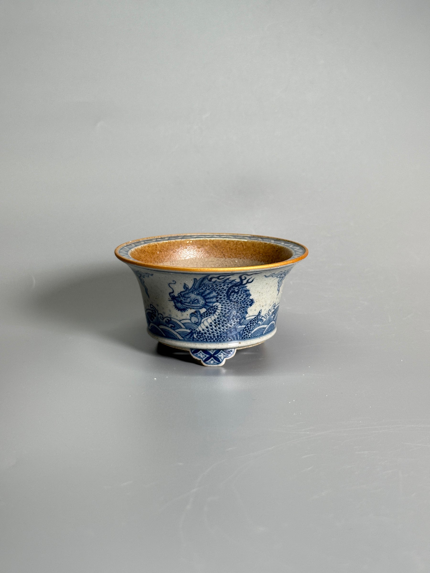 Dragon Among the Waves Coarse Stoneware Tripod Pot