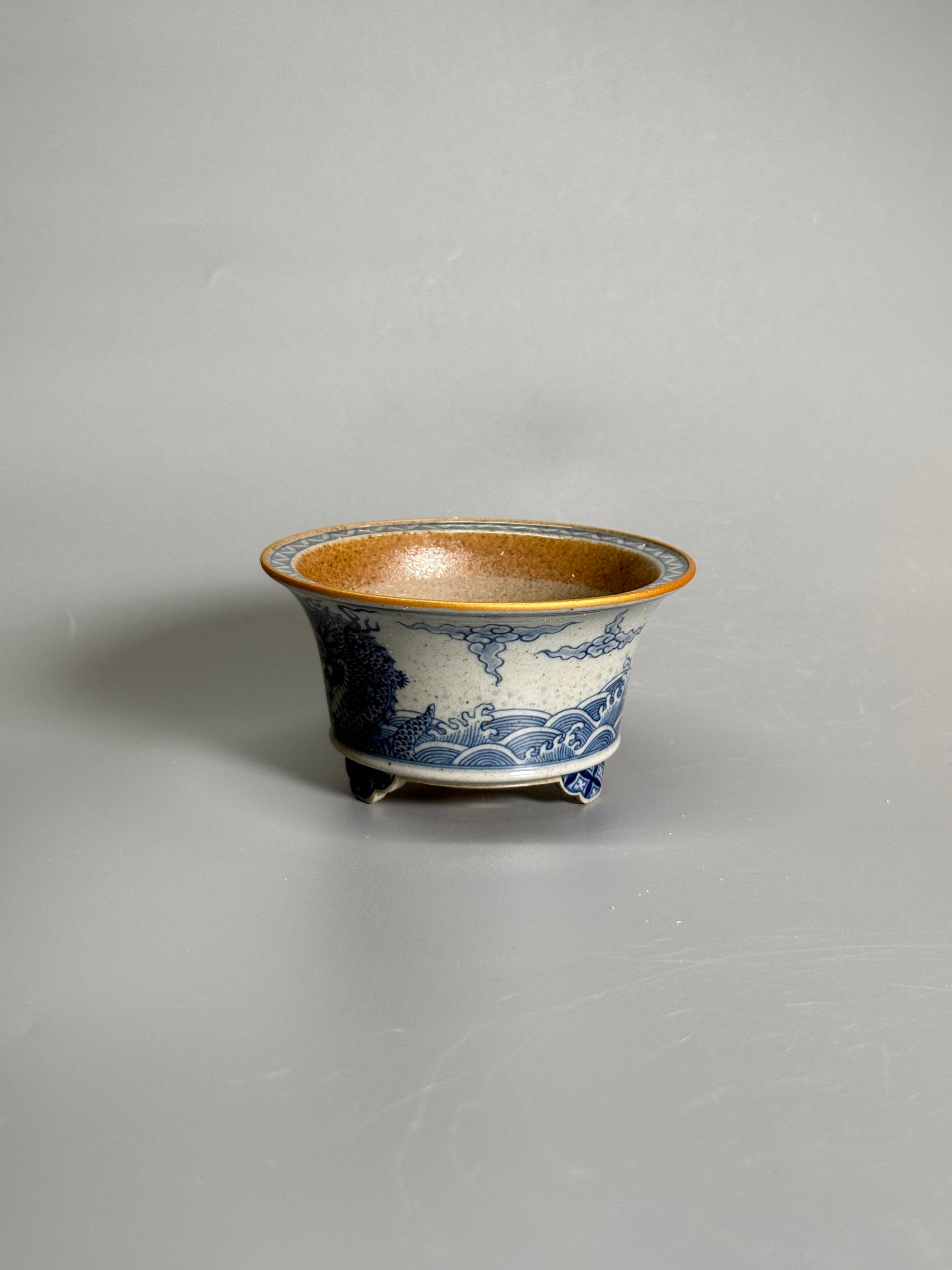 Dragon Among the Waves Coarse Stoneware Tripod Pot