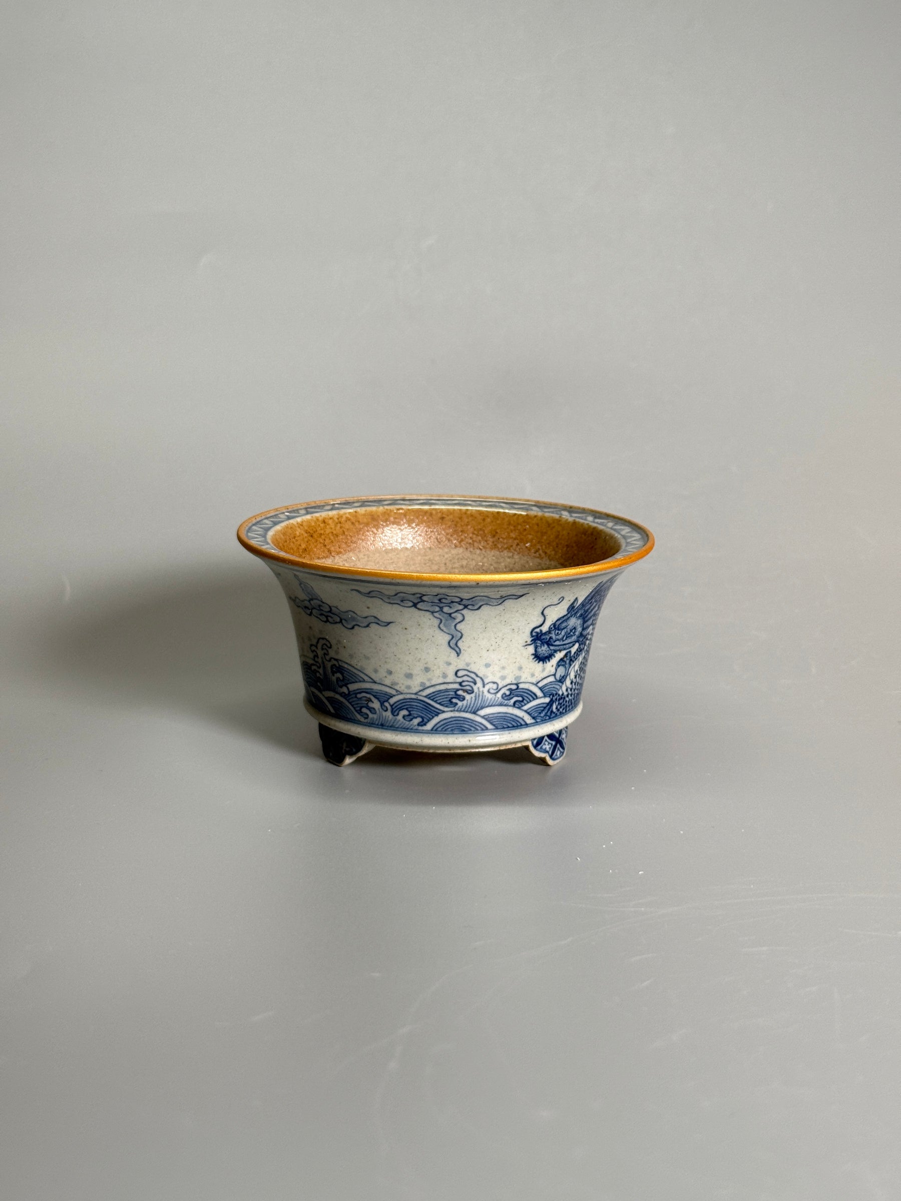 Dragon Among the Waves Coarse Stoneware Tripod Pot