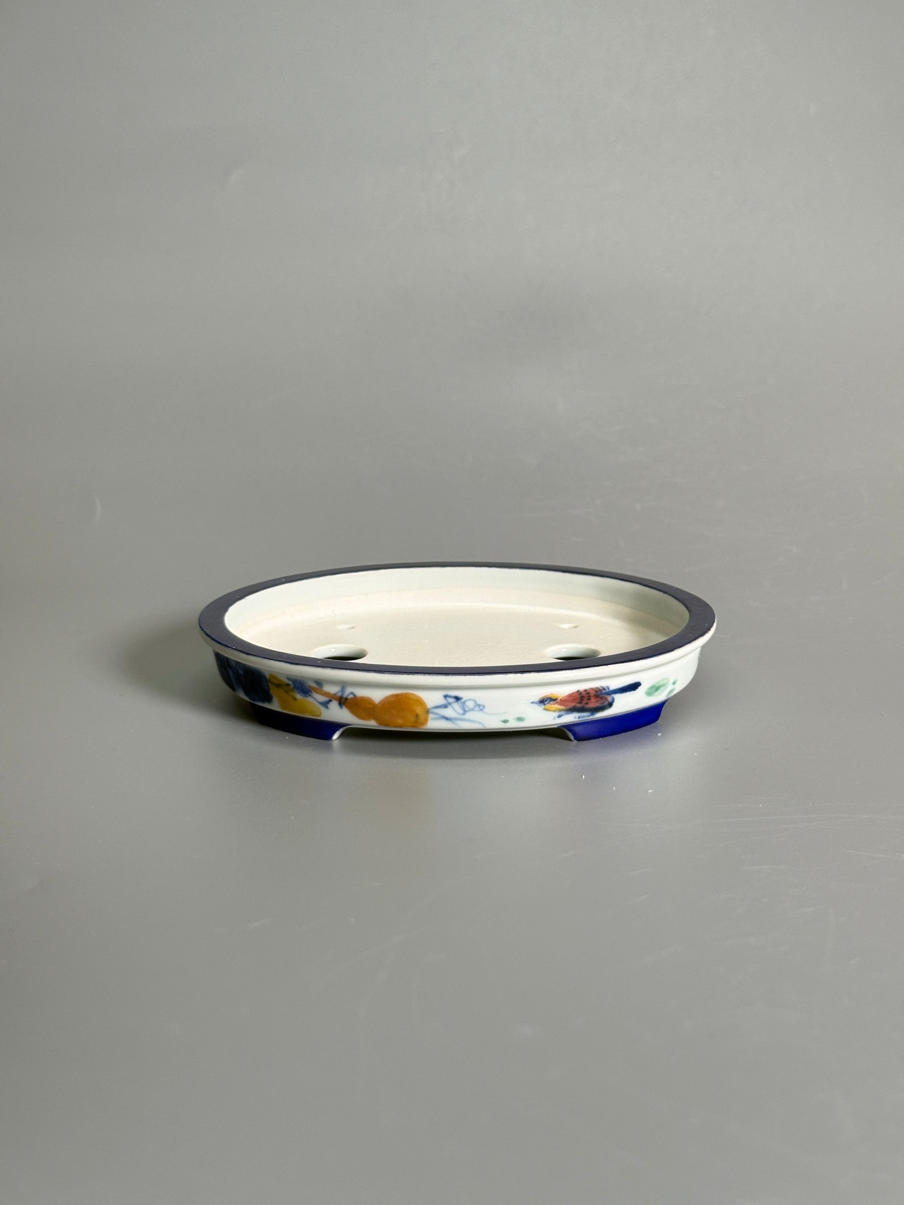 Elegant Pastime Polychrome Oval Pot