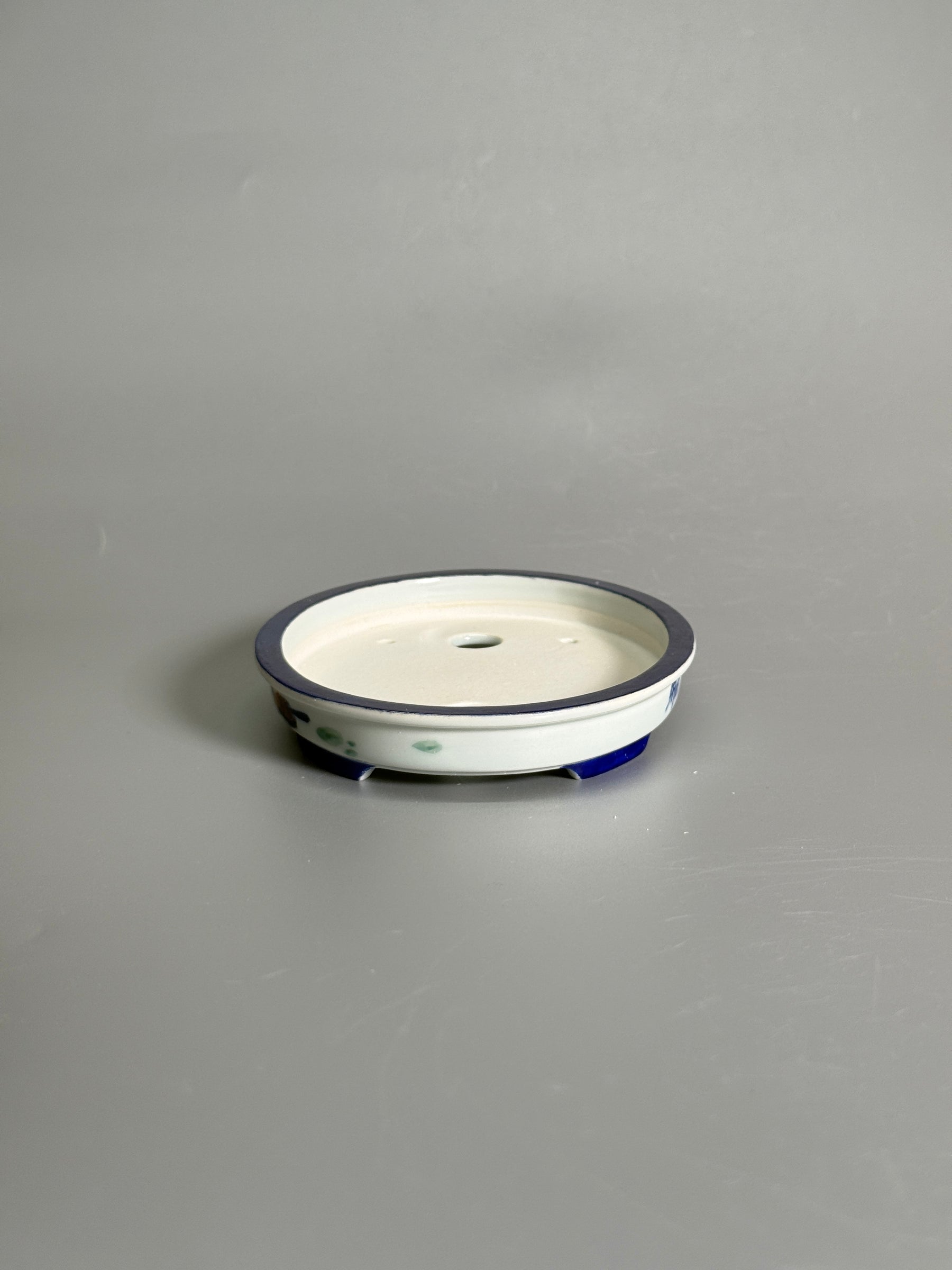 Elegant Pastime Polychrome Oval Pot