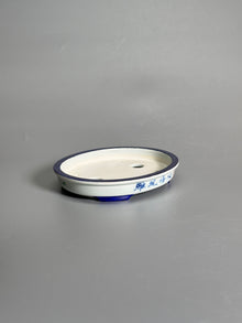 Elegant Pastime Polychrome Oval Pot