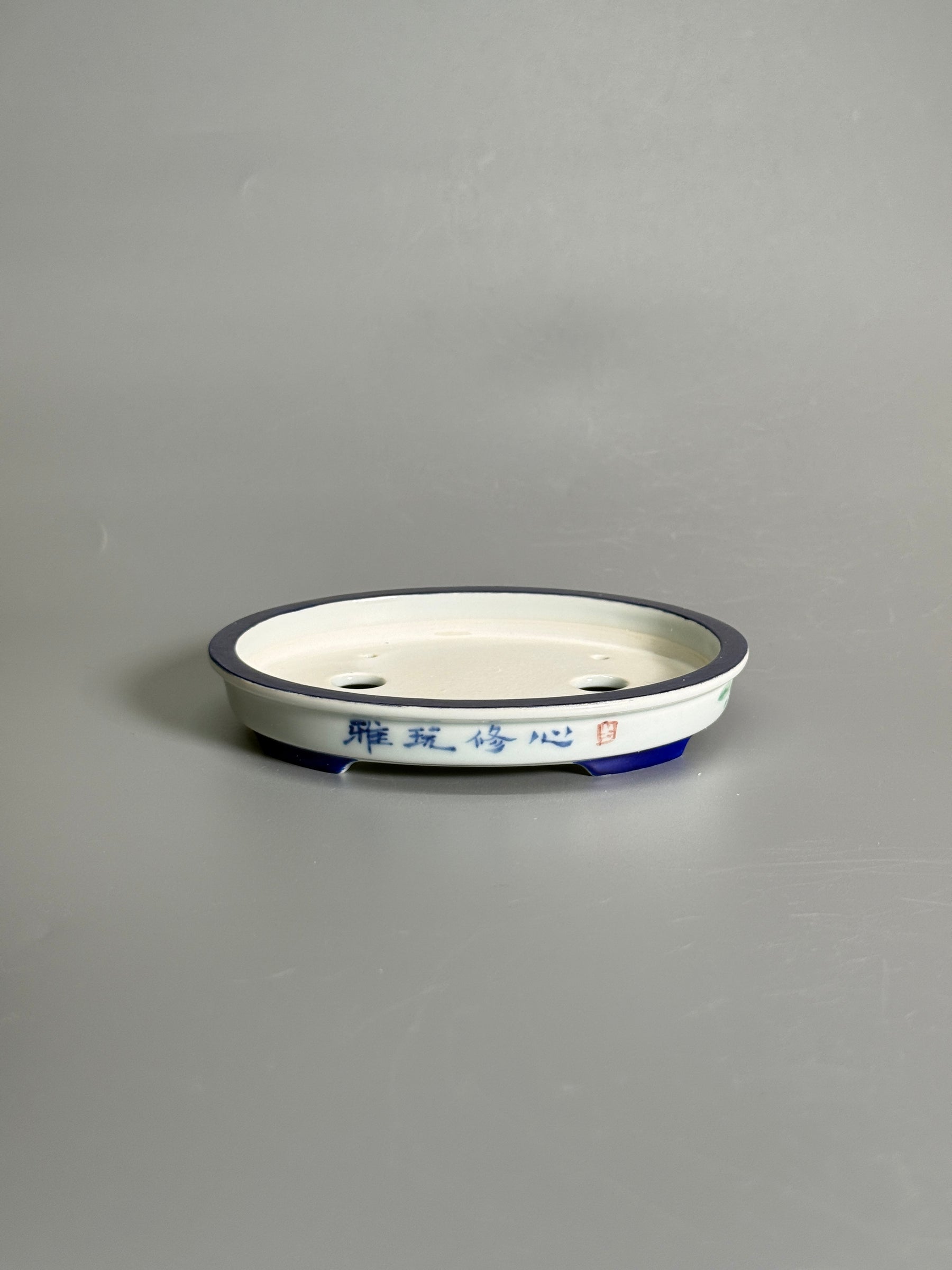 Elegant Pastime Polychrome Oval Pot