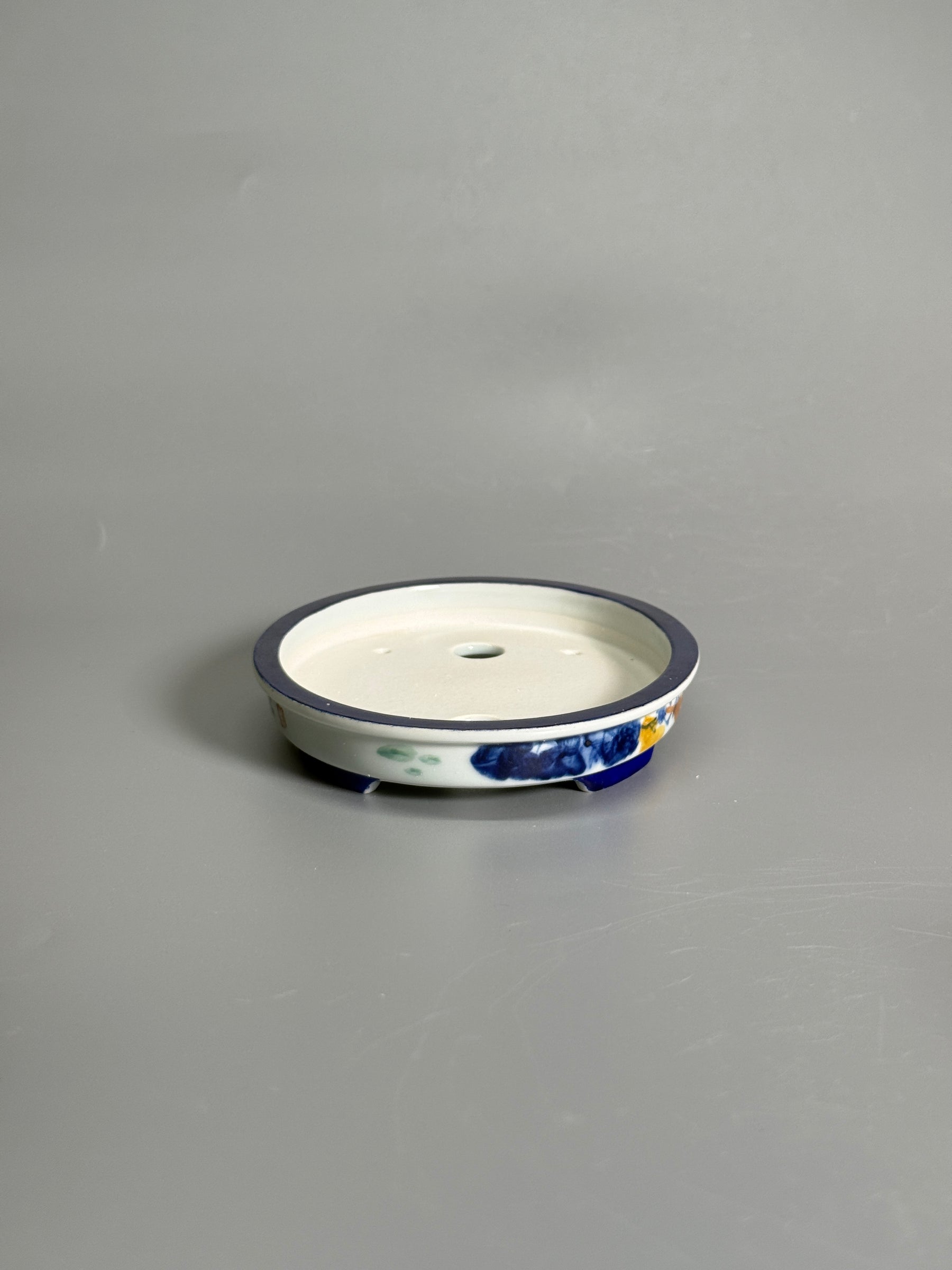 Elegant Pastime Polychrome Oval Pot