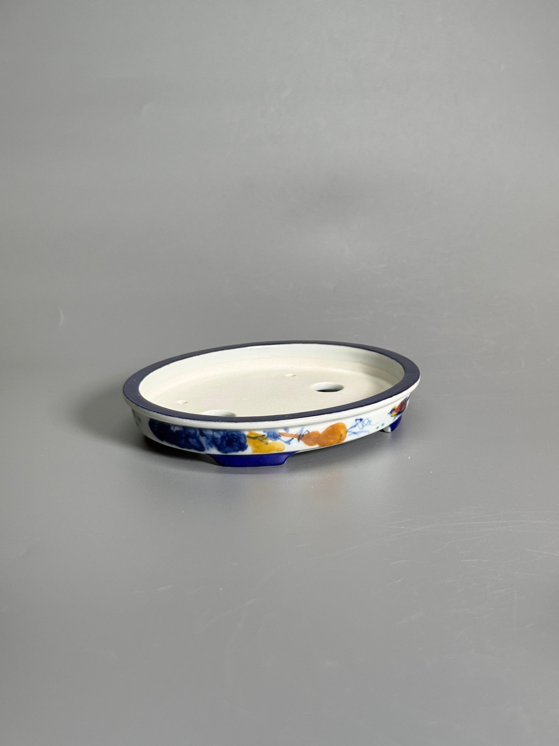 Elegant Pastime Polychrome Oval Pot