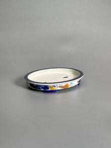 Elegant Pastime Polychrome Oval Pot